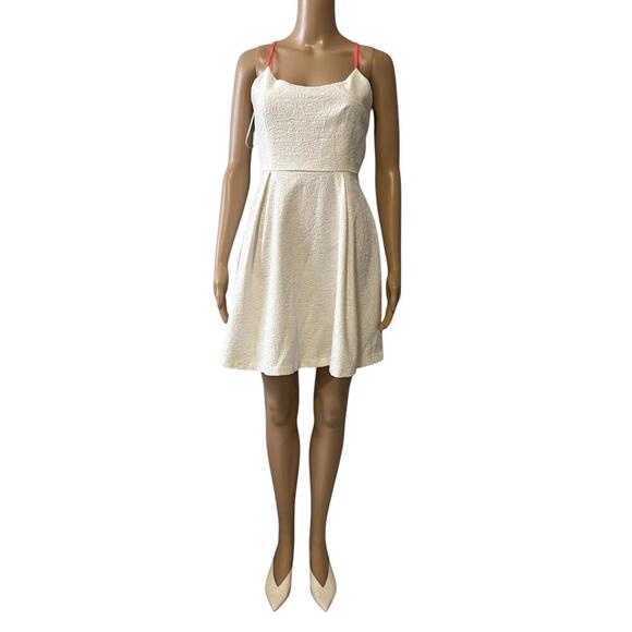 Chic White Mini Dress with Pink Straps - Picture 1 of 6